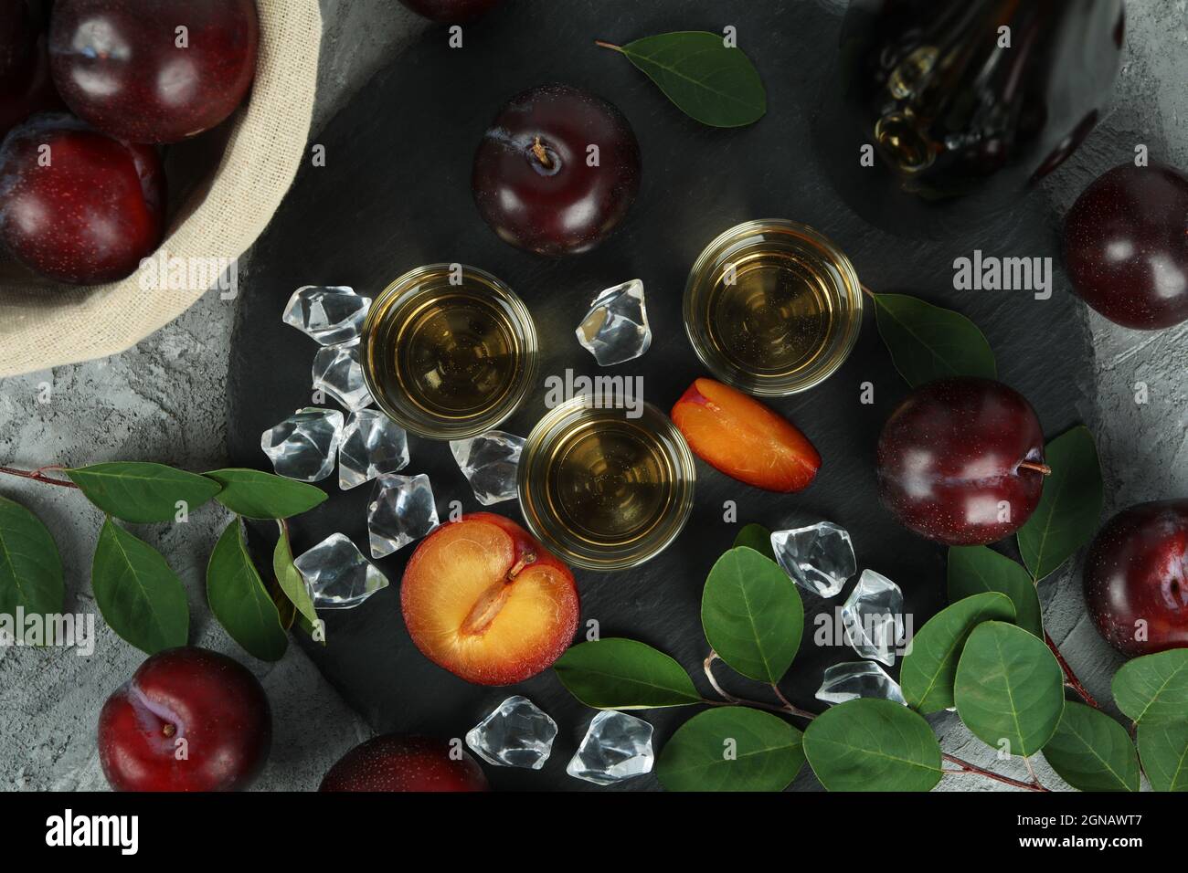 Concept of alcohol with plum vodka, top view Stock Photo Alamy
