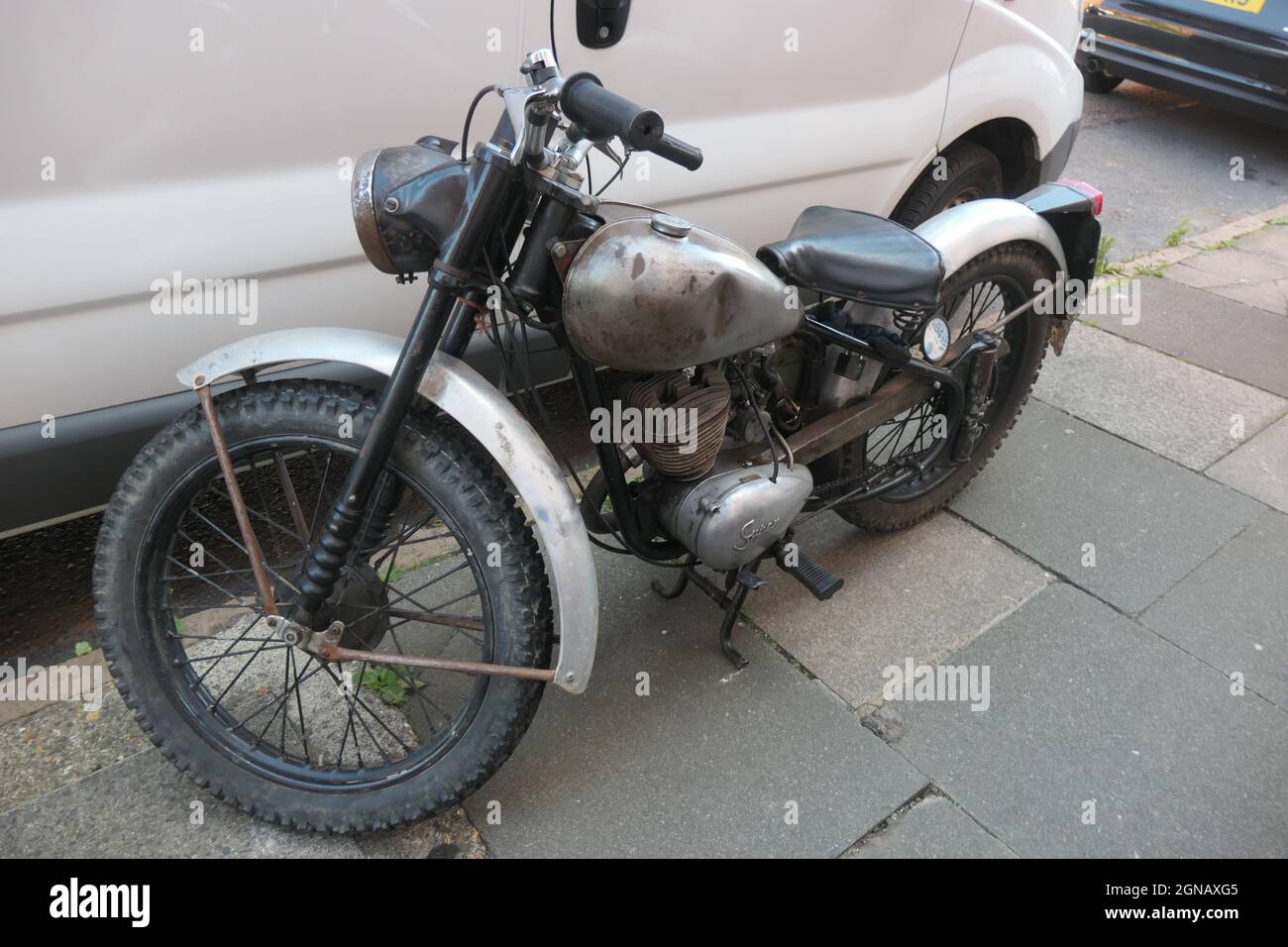 1957 BSA Bantam motorbike in Northampton UK old style type vintage bike parked on the pavement in the street local Northampton single seater outside Stock Photo Alamy