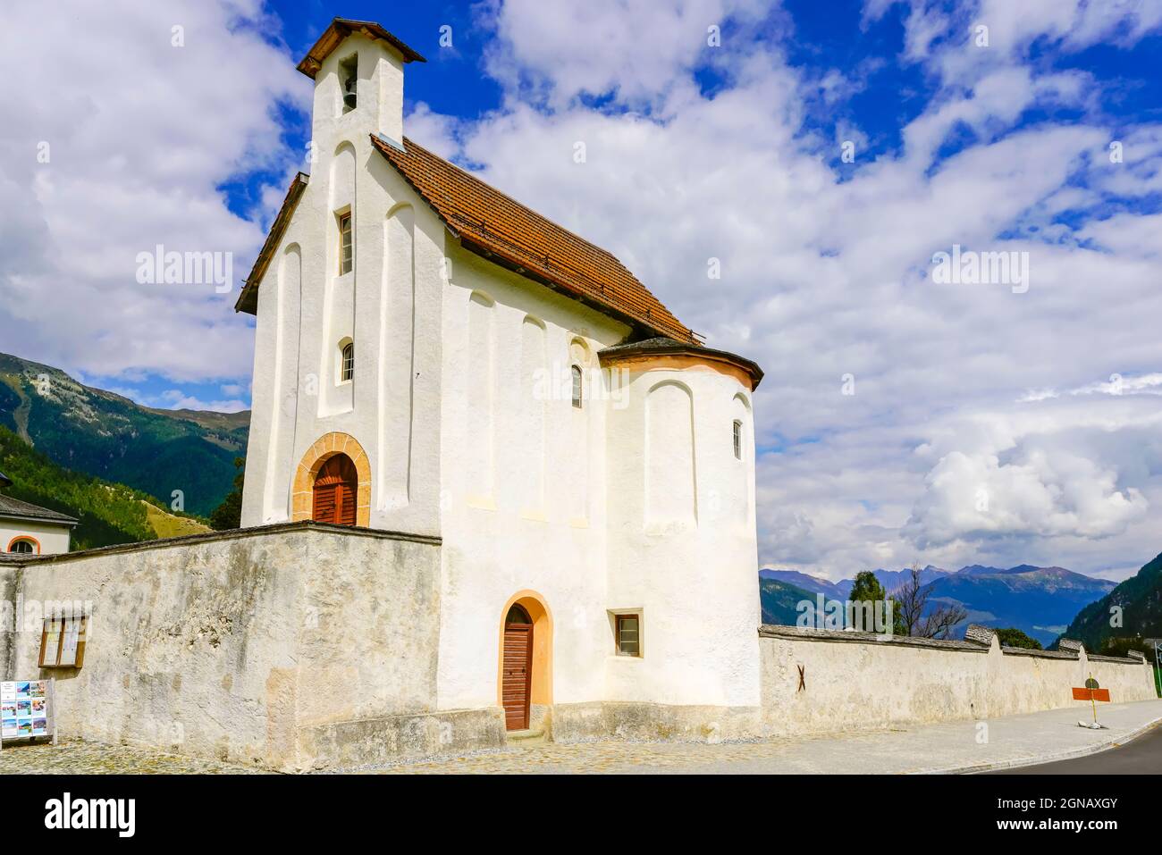Chapel of the Cross, the Abbey of Saint John  is an ancient Benedictine monastery in the Swiss municipality of Val Müstair, in the Canton of Graubünde Stock Photo