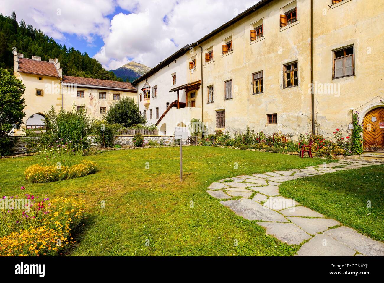 The Abbey of Saint John  is an ancient Benedictine monastery in the Swiss municipality of Val Müstair, in the Canton of Graubünden. Stock Photo