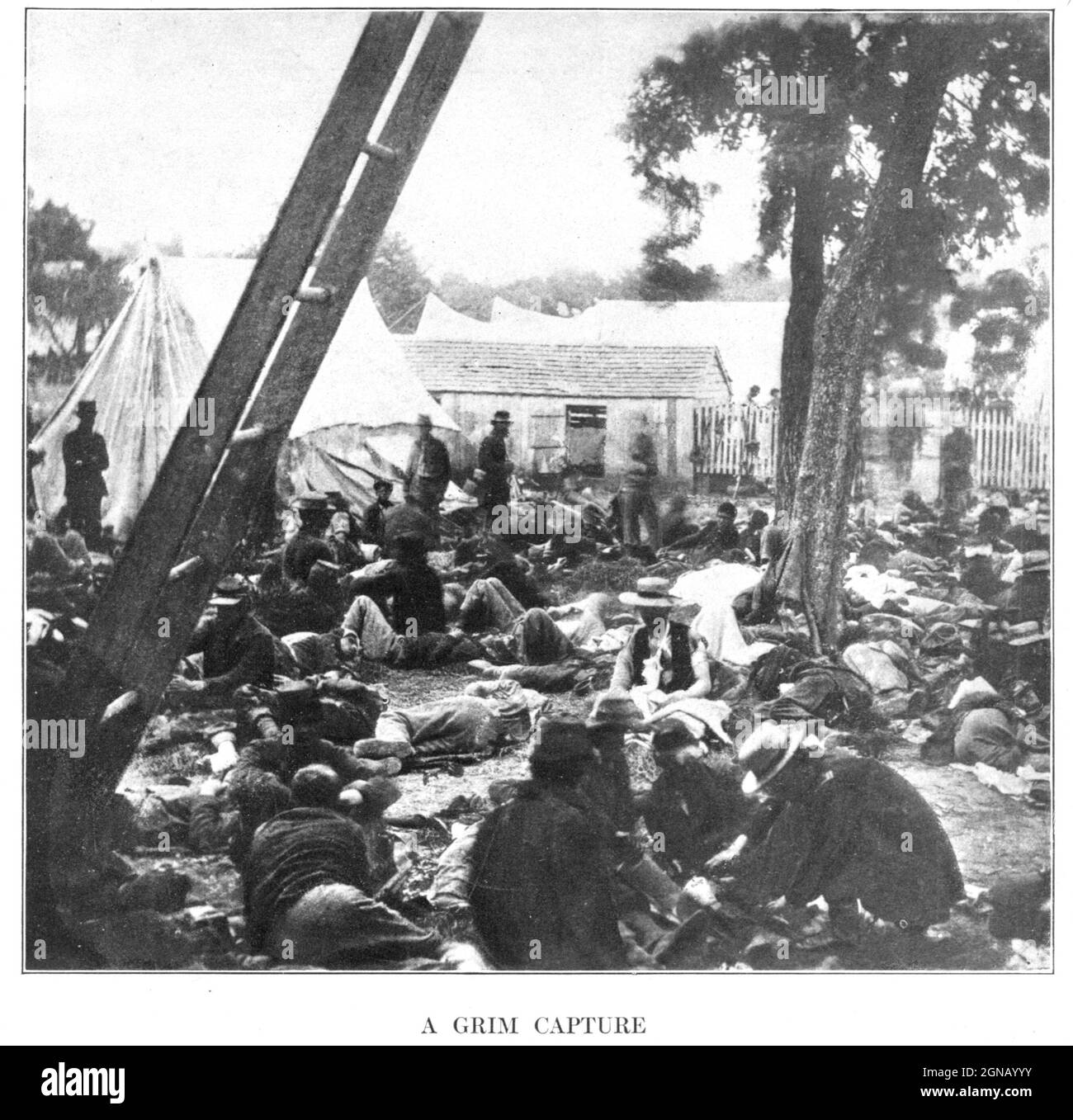 brave medical officers left behind to tend to the wounded that were abandoned by General Magruder at Savage Station on June 29th. from the book ' The Civil war through the camera ' hundreds of vivid photographs actually taken in Civil war times, sixteen reproductions in color of famous war paintings. The new text history by Henry W. Elson. A. complete illustrated history of the Civil war Stock Photo