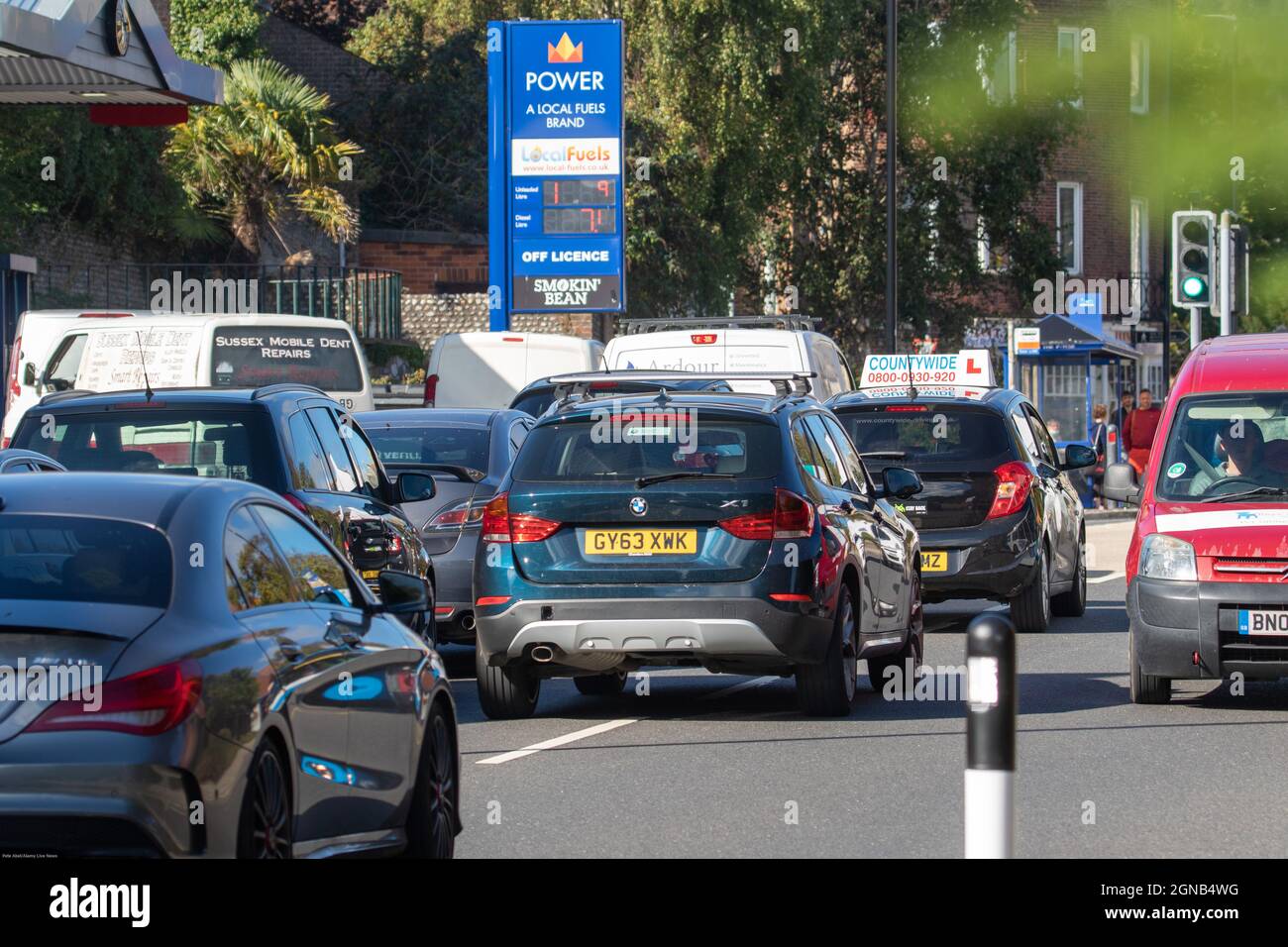 Eastbourne, Sussex, UK. 24th Sep, 2021. Motorists have started panic buying fuel across the UK after a number of retailers announced a small number of petrol forecourt cloosures due to driver shortage. In Eastbourne motorists have joined long queues, which is causing tailbacks throughout the town. Credit: Pete Abel/Alamy Live News Stock Photo