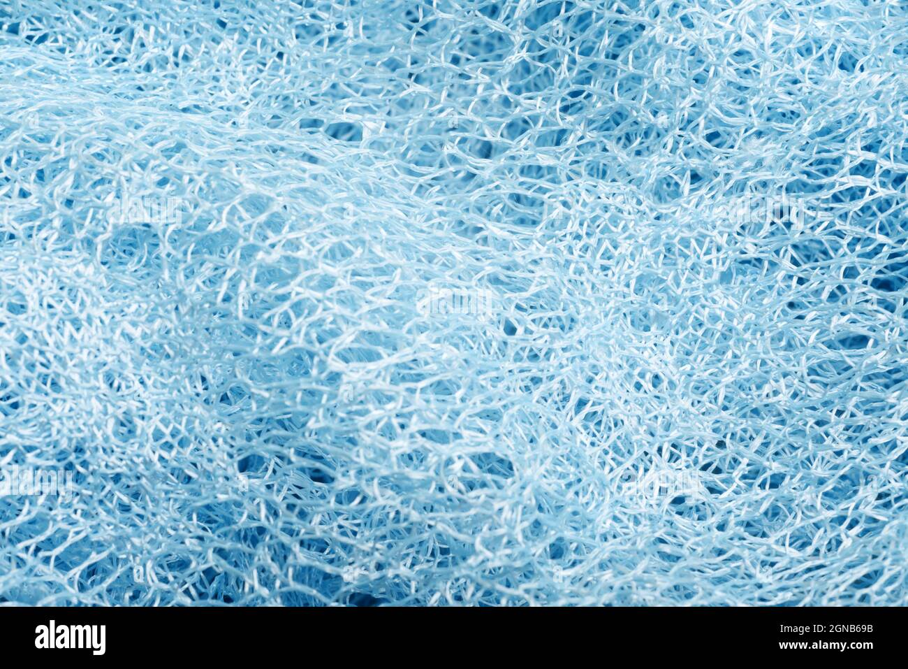 Close up of blue net knitted textured background. Trendy colors Stock ...
