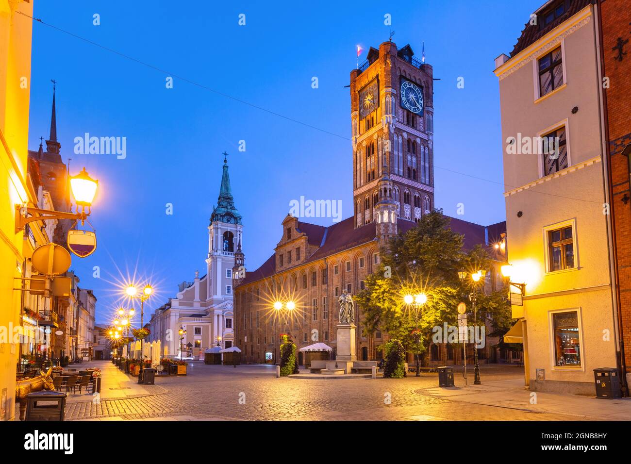 Morning panorama of Gothic Old Town Hall, Ratusz Staromiejski, in Torun, Poland Stock Photo