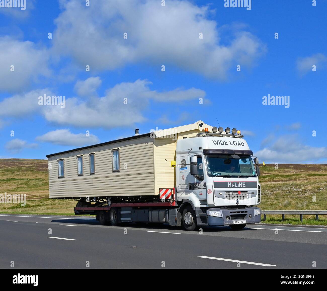 HGV. Hi-Line Caravan Transport Limited. M6 Motorway, Southbound. Shap, Cumbria, England, United Kingdom, Europe. Stock Photo