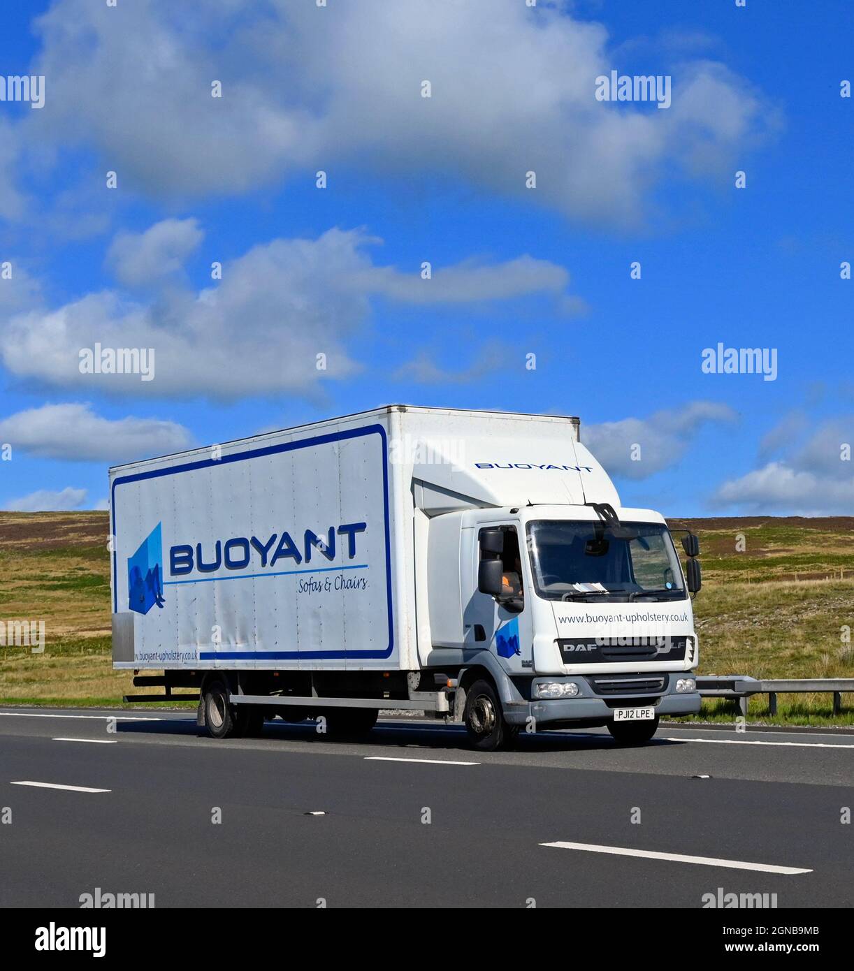 Goods Vehicle. Buoyant Upholstery Limited. M6 Motorway, Southbound. Shap, Cumbria, England, United Kingdom, Europe. Stock Photo