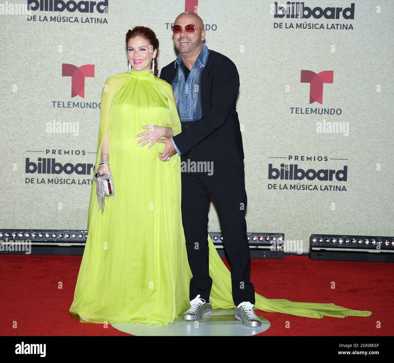 Coral Gables, United States. 24th Sep, 2021. Yomaira Ortiz Feliciano and Wisin (R) arrive on the red carpet at the 2021 Latin Billboard Music Awards at the University of Miami, Watsco Center, Thursday, September 23, 2021 in Coral Gables, Florida. Photo by Gary I Rothstein/UPI Credit: UPI/Alamy Live News Stock Photo