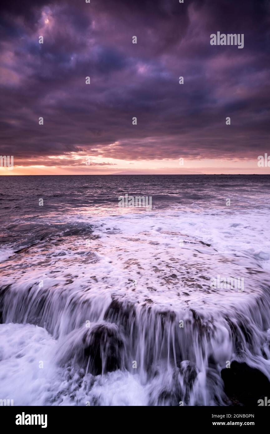 Sunset landscape at the beach with sea ocean and waves in background ...