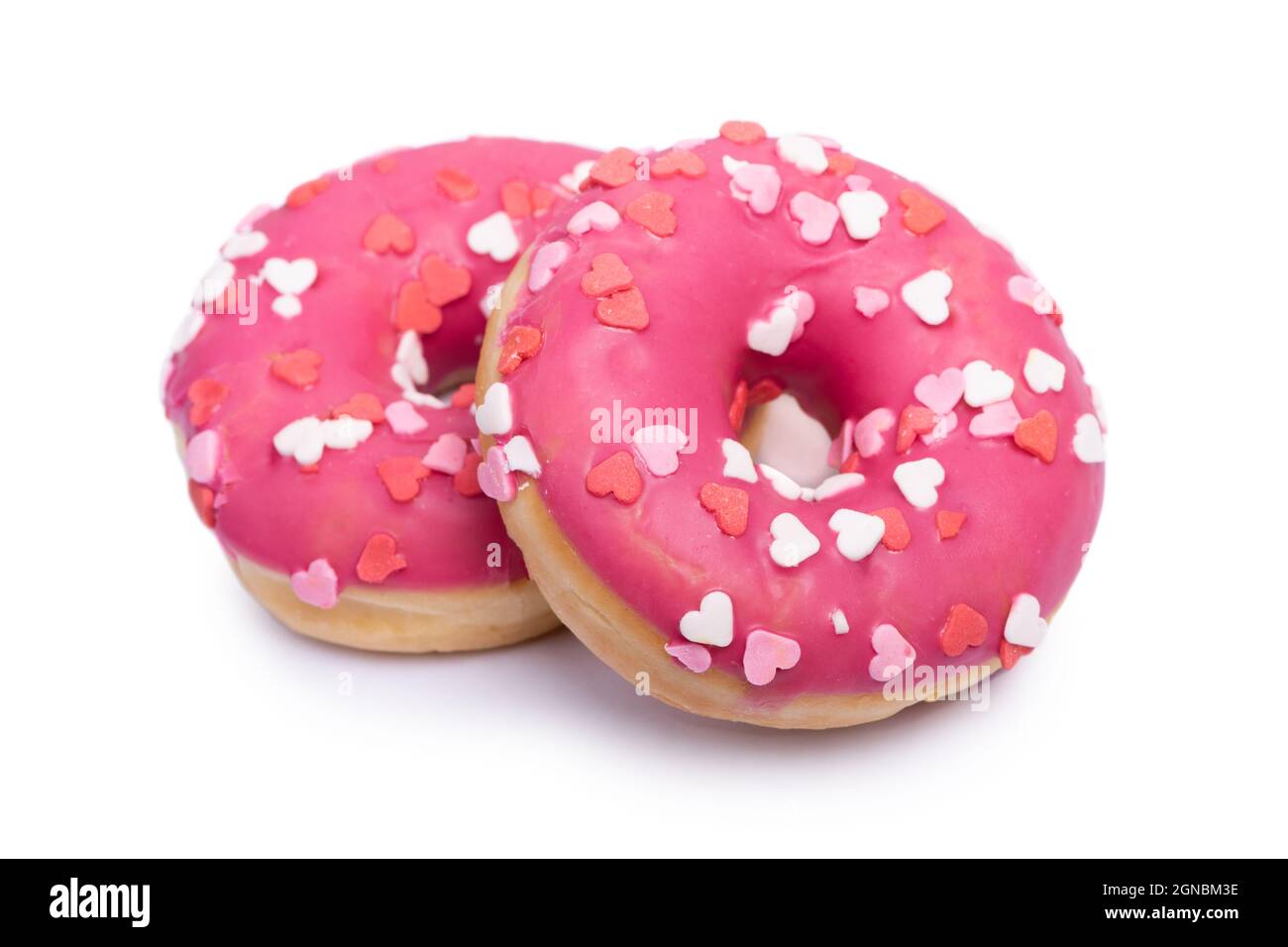 Decorated pink donut isolated over white background Stock Photo