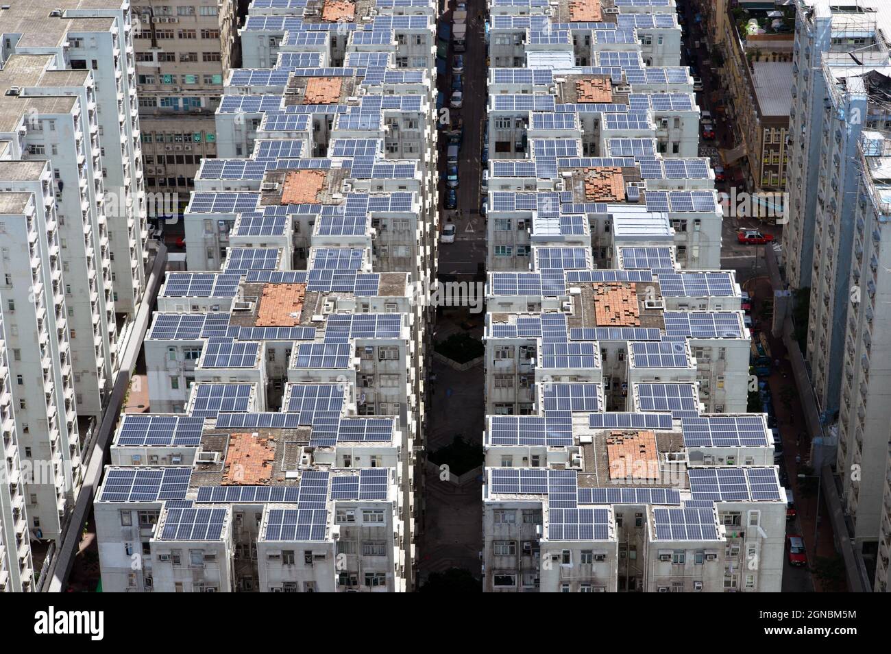 Rooftops with solar panels at Wyler Gardens (偉恆昌新邨), a residential area in To Kwa Wan, Kowloon, Hong Kong Stock Photo