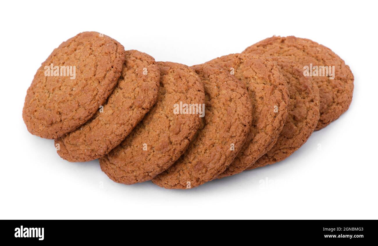 Stack oatmeal cookies, group of round cookies isolated over white background Stock Photo