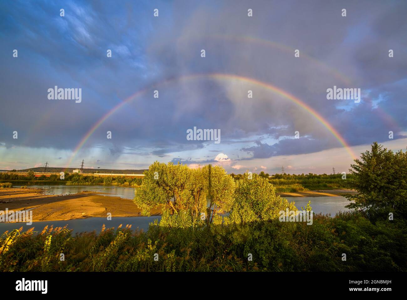 landscape with a double rainbow appeared after the rain Stock Photo - Alamy