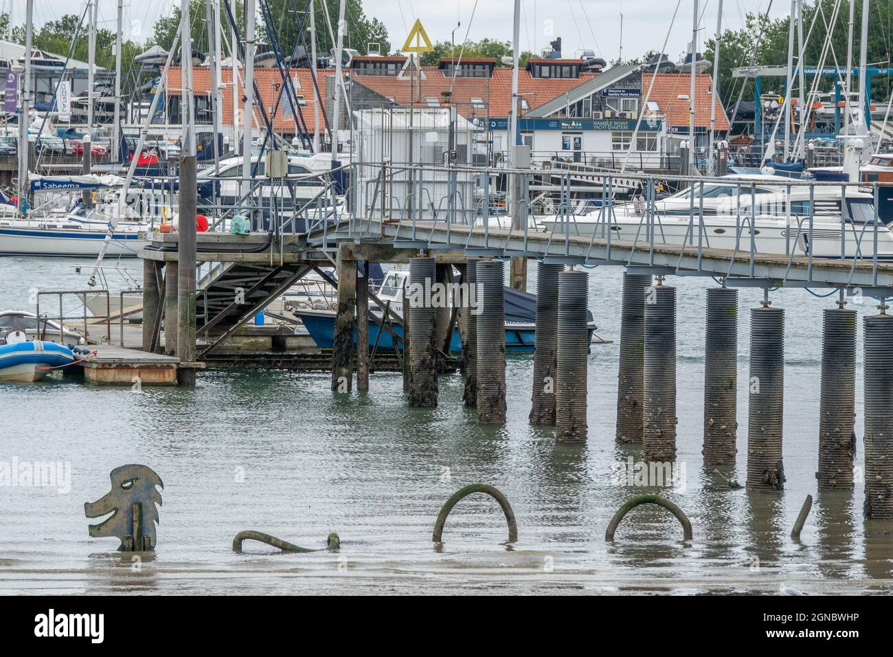 metal sculpture of the Loch Ness Monster in the water at Warsash Hampshire England Stock Photo