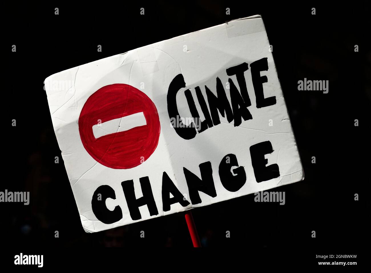 Turin, Italy. 24 September 2021. A placard reading 'Climate change' is seen during 'Fridays for future' demonstration, a worldwide climate strike against governmental inaction towards climate breakdown and environmental pollution. Credit: Nicolò Campo/Alamy Live News Stock Photo