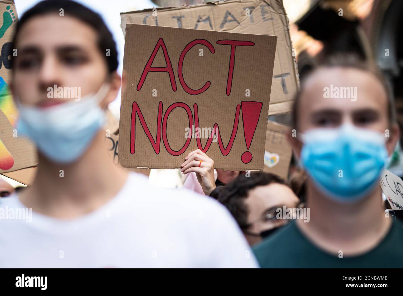 Turin, Italy. 24 September 2021. A placard reading 'Act now!' is seen during 'Fridays for future' demonstration, a worldwide climate strike against governmental inaction towards climate breakdown and environmental pollution. Credit: Nicolò Campo/Alamy Live News Stock Photo