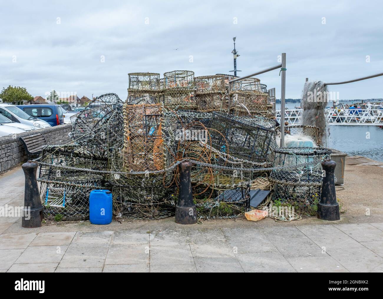 Closeup shot of fishing crates and nets on Poole quay Stock Photo Alamy