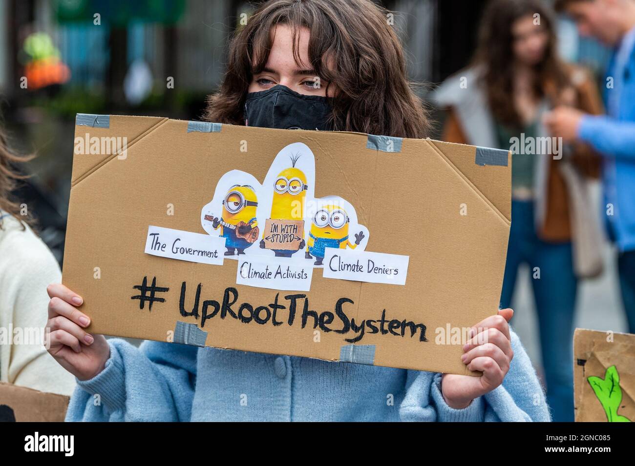 Cork, Ireland. 24th Sep, 2021. Fridays for Future held a global climate strike on Grand Parade in Cork city today, demanding climate justice within Ireland and around the world. Most protestors held signs and placards. Credit: AG News/Alamy Live News Stock Photo