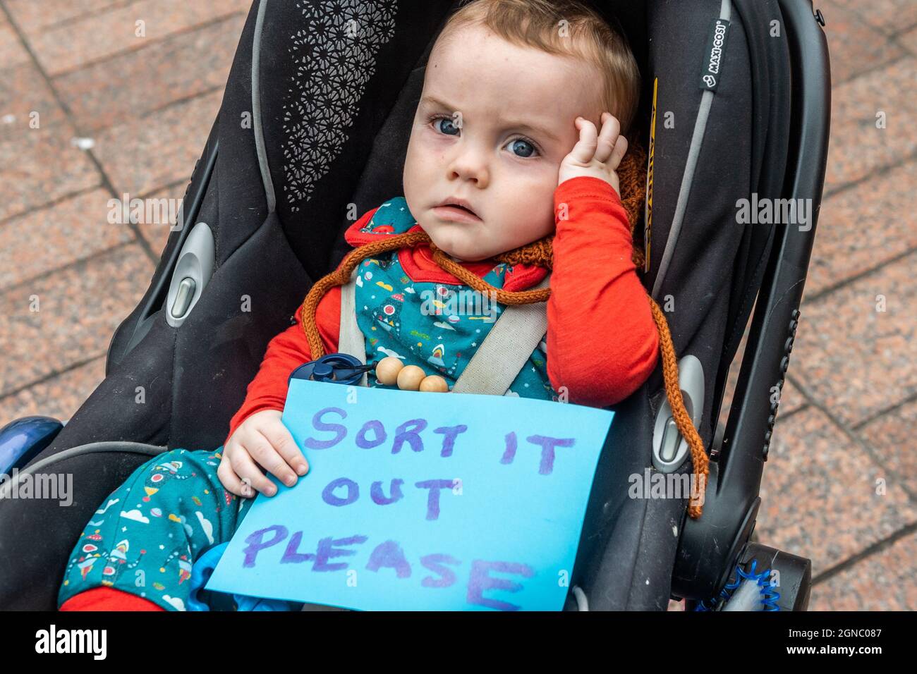 Cork, Ireland. 24th Sep, 2021. Fridays for Future held a global climate strike on Grand Parade in Cork city today, demanding climate justice within Ireland and around the world. At the protest was 9 month old Oisín O'Sullivan-Brennan from The Lough. Credit: AG News/Alamy Live News Stock Photo