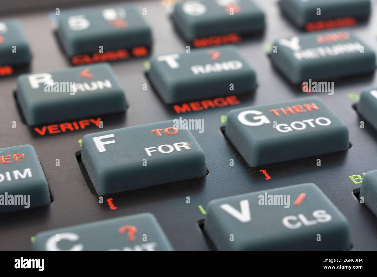 Sinclair ZX Spectrum keyboard close-up. Focus on Basic FOR command key. Vintage 8-bit home computer from 1980s (see Notes). Stock Photo