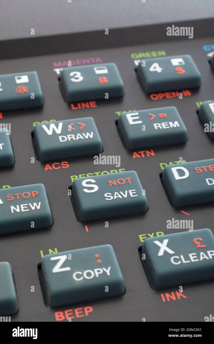 Sinclair ZX Spectrum keyboard close-up. Focus on Basic SAVE program command key. Vintage 8-bit home computer from 1980s (see Notes). Stock Photo