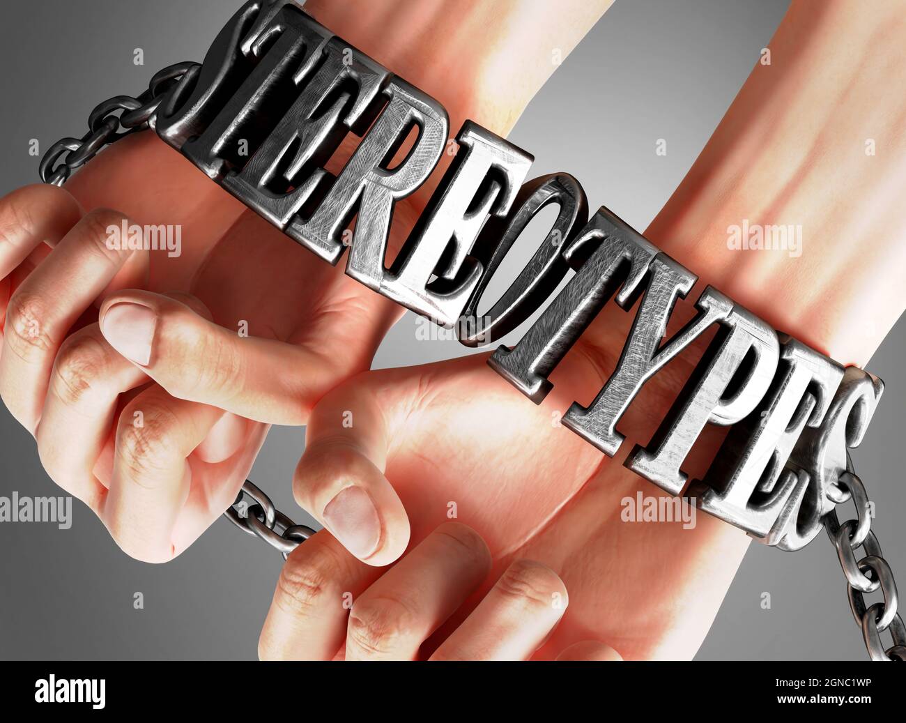 Social impact and influence of stereotypes - analogy showing human hands in chains with a word stereotypes as a symbol of its burden and misery it bri Stock Photo