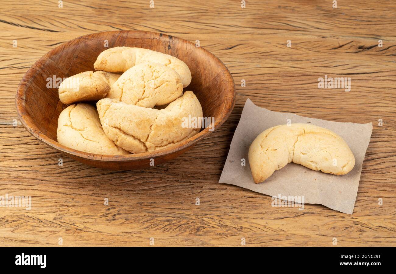 Chipas, typical south american cheese bun over wooden table. Stock Photo