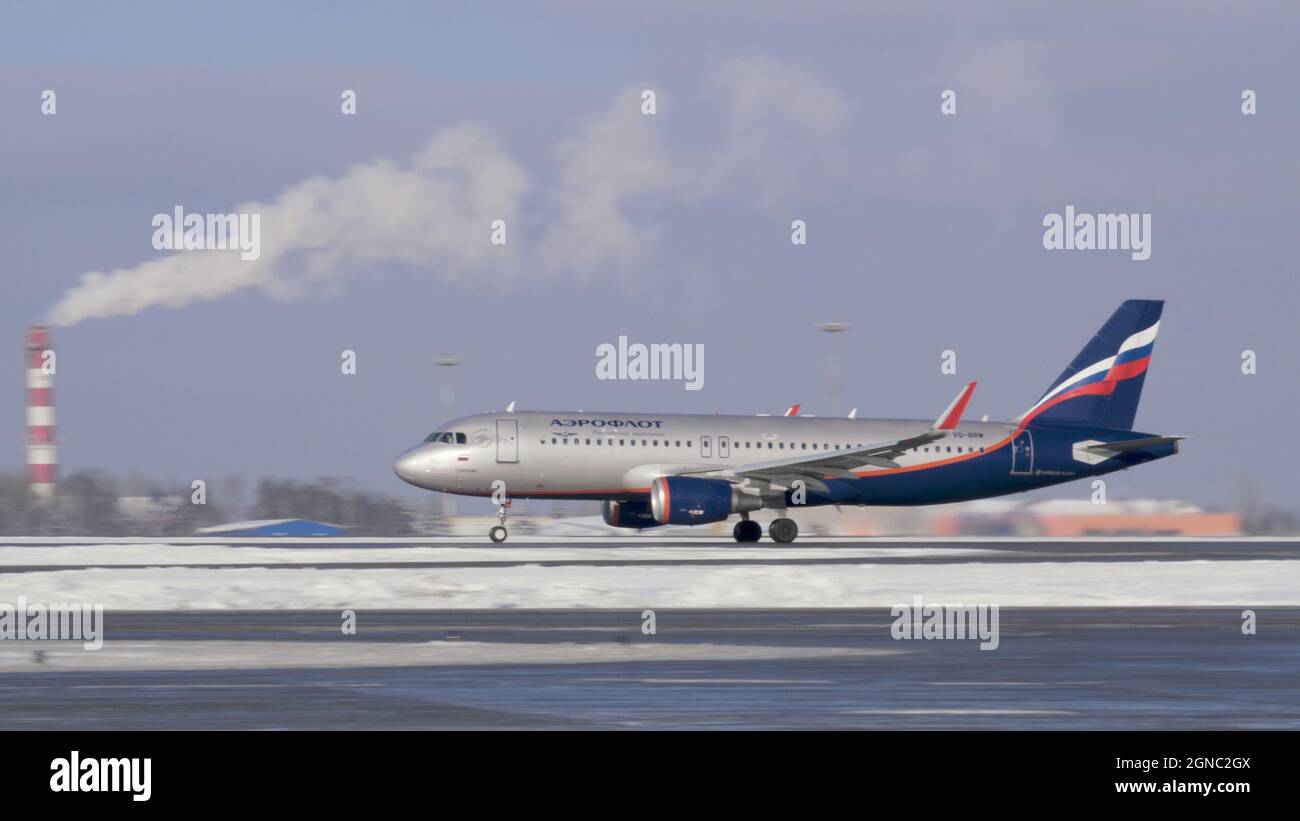 Airliner Airbus A320 of Aeroflot taking off, winter view Stock Photo