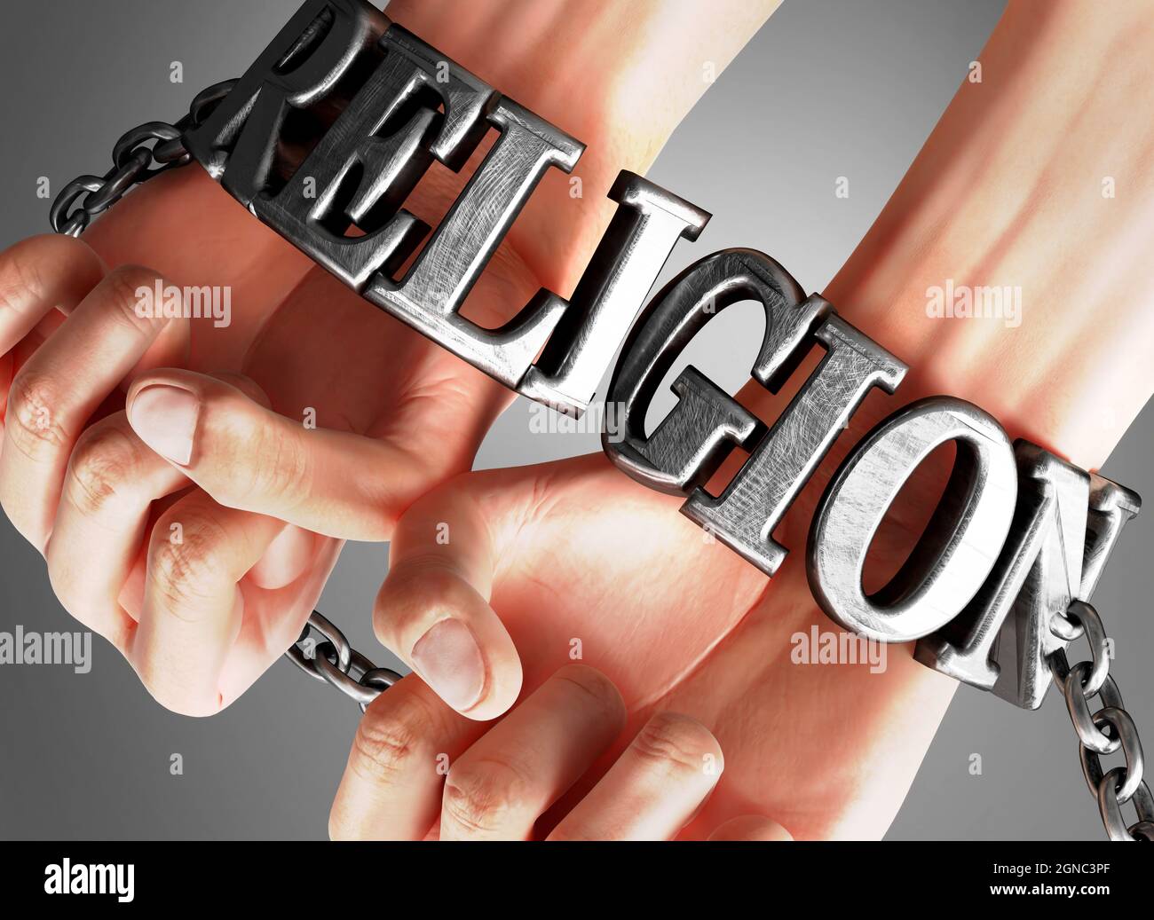 Social impact and influence of religion - analogy showing human hands in chains with a word religion as a symbol of its burden and misery it bring to Stock Photo