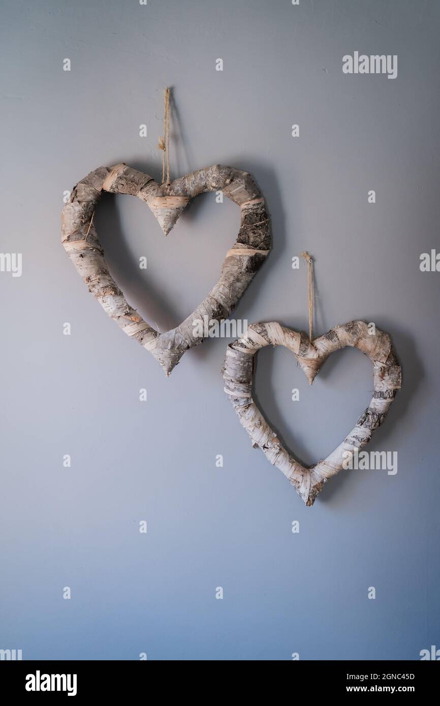Two heart shapes hanging Stock Photo
