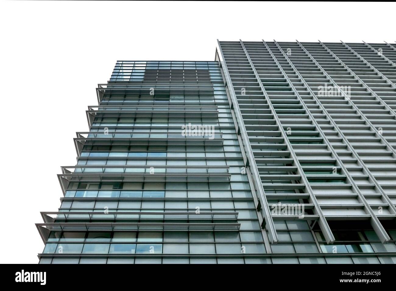 Low angle shot of high-rise modern buildings under a cloudy sky Stock ...