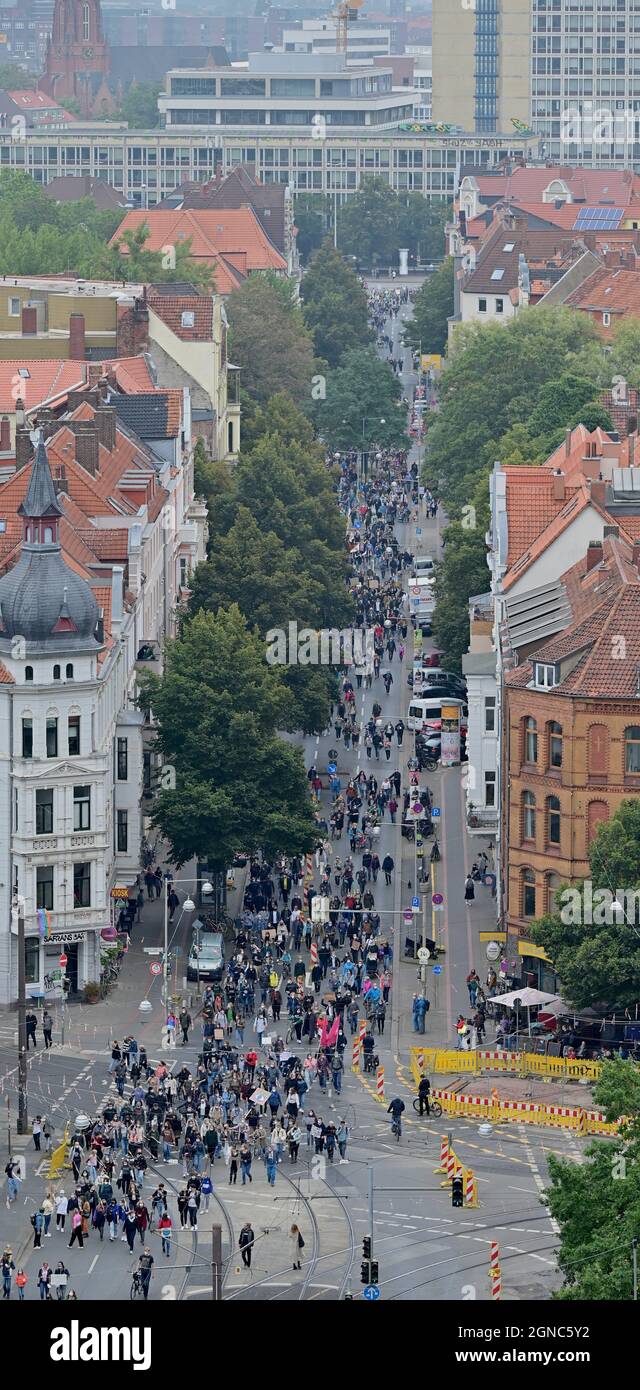 Hanover, Germany. 24th Sep, 2021. People walk through the city centre during a demonstration of the 'Fridays for Future' movement. Shortly before the federal election, actions are taking place in Germany and around the world in the 'climate strike'. Credit: Julian Stratenschulte/dpa/Alamy Live News Stock Photo