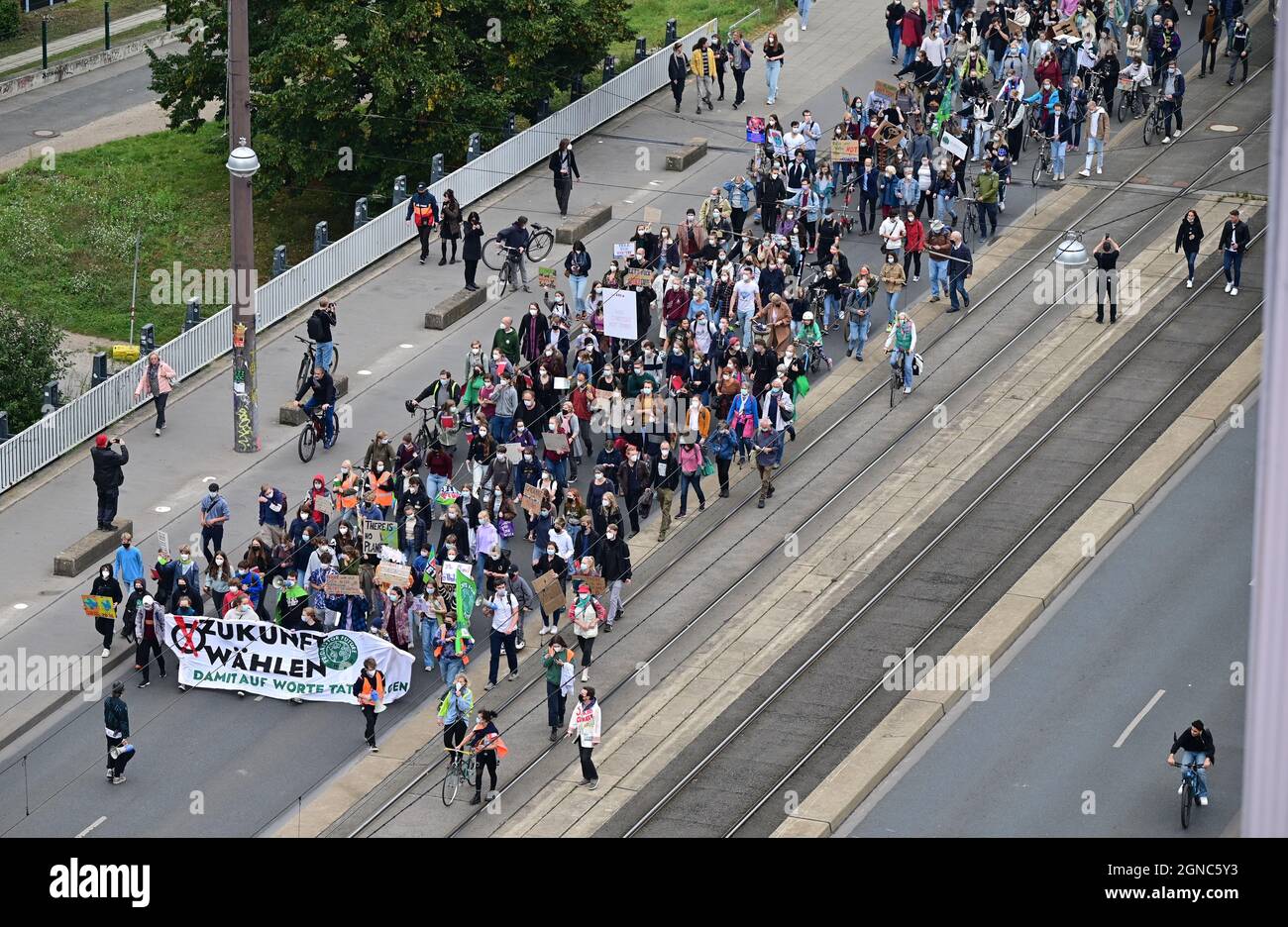 Hanover, Germany. 24th Sep, 2021. People walk through the city centre during a demonstration of the 'Fridays for Future' movement. Shortly before the federal election, actions are taking place in Germany and around the world in the 'climate strike'. Credit: Julian Stratenschulte/dpa/Alamy Live News Stock Photo