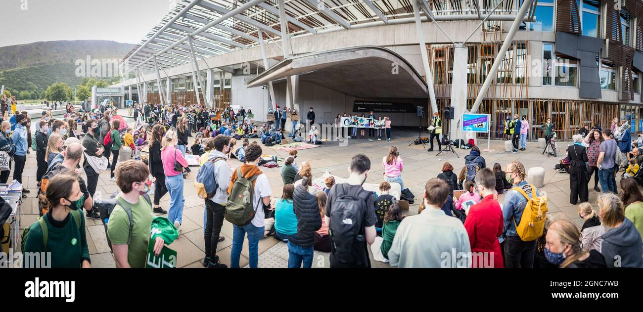Edinburgh, Scotland. Friday 24 September 2021. Participants at the Fridays for Future protest outside the Scottish Parliament.  Fridays for Future is a youth-led and -organised global climate strike movement that started in August 2018, when 15-year-old Greta Thunberg began a school strike for climate. More information at https://fridaysforfuture.org/. Stock Photo