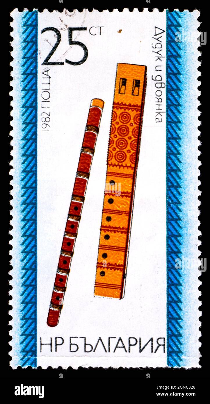 BULGARIA - CIRCA 1982: A stamp printed in BULGARIA shows image of the Bulgarian folk music instrument Stock Photo