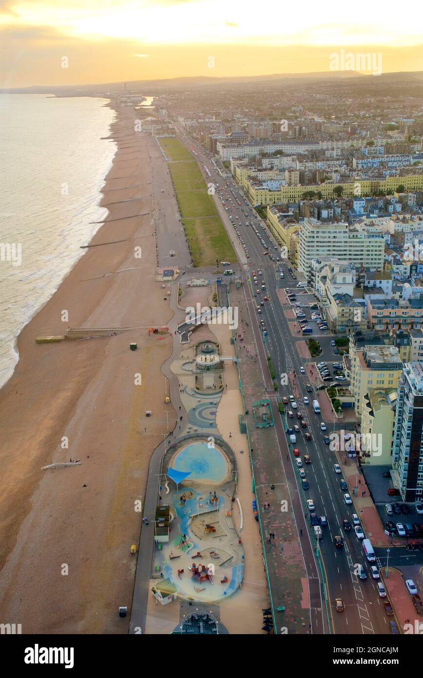View from the i360 looking west towards Hove across the sea, beaches, lawns and townscape, with Regency houses lining the coast road. Brighton & Hove, East Sussex, England, UK Stock Photo