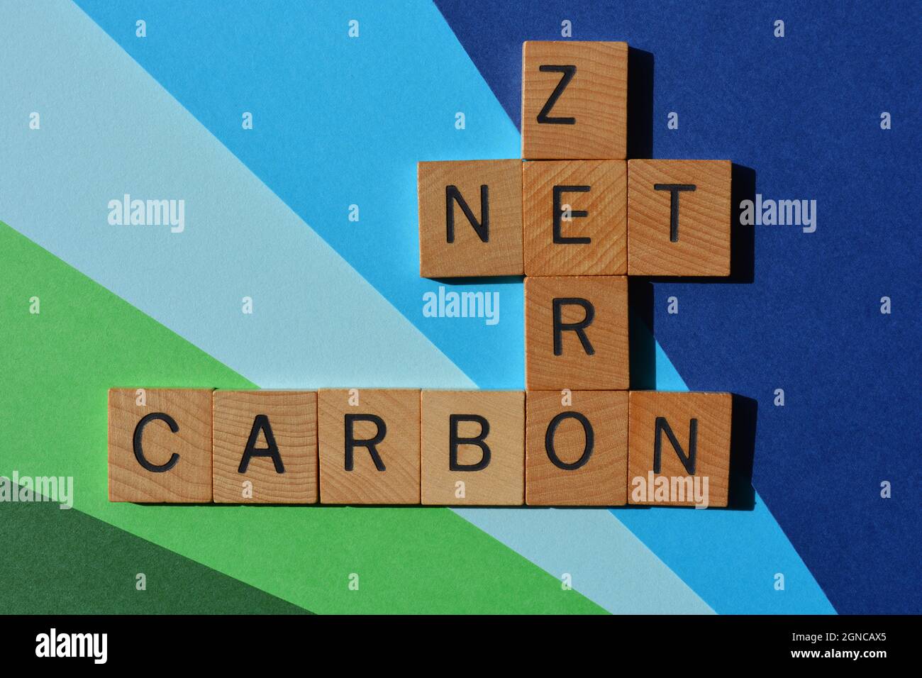 Net, Zero, Carbon, words in wooden alphabet letters in crossword form Stock Photo