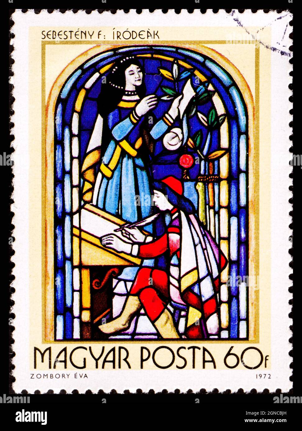 HUNGARY - CIRCA 1972: A stamp printed by Hungary, shows Stained-glass Window, 16th century scribe, by Ferenc Sebesteny Stock Photo