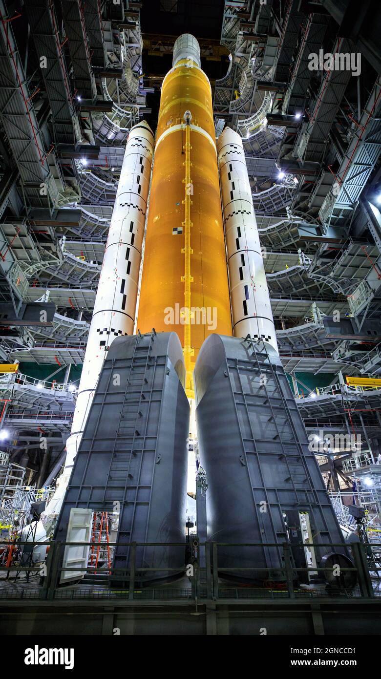 Inside High Bay 3 of the Vehicle Assembly Building at NASAÕs Kennedy Space Center, Florida. The work platforms have been retracted from around the Artemis I Space Launch System atop the mobile launcher. In later missions, NASA will land the first woman and the first person of color on the Moon. Sept. 20, 2021.  An optimised and digitally enhanced version of a NASA image / credit NASA. Stock Photo