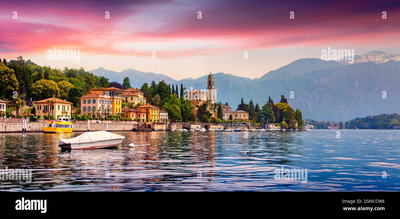 Colorful summer panorama of the Mezzegra town. Dramatic morning scene on the Como lake, province of Lombardy, Italy, Europe. Beautiful sunrise in the Stock Photo