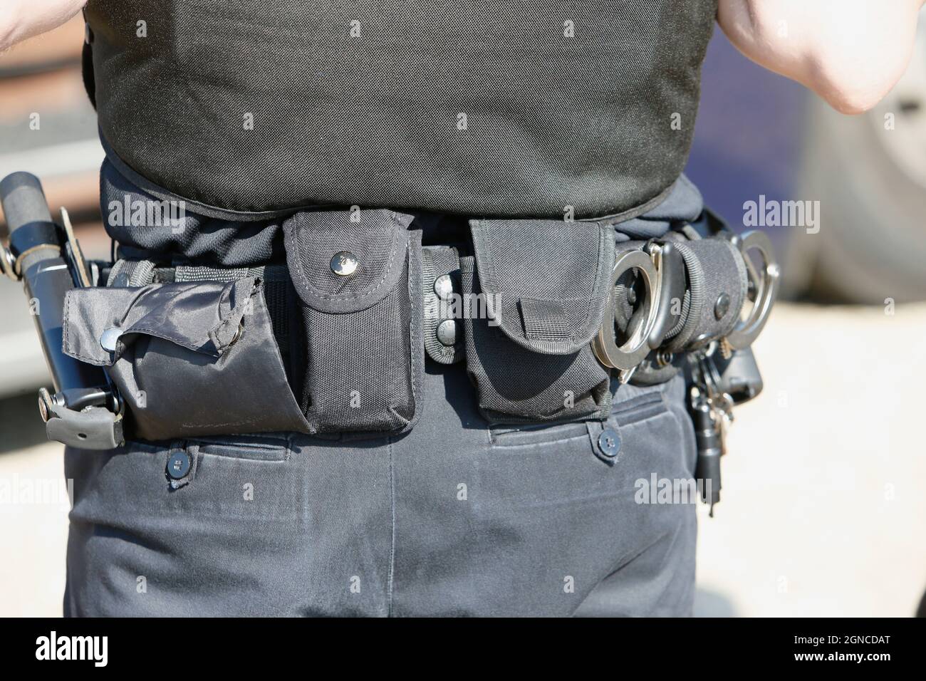 Law & Order, Crime, Police, Detail of police officers belt with handcuffs etc. Stock Photo