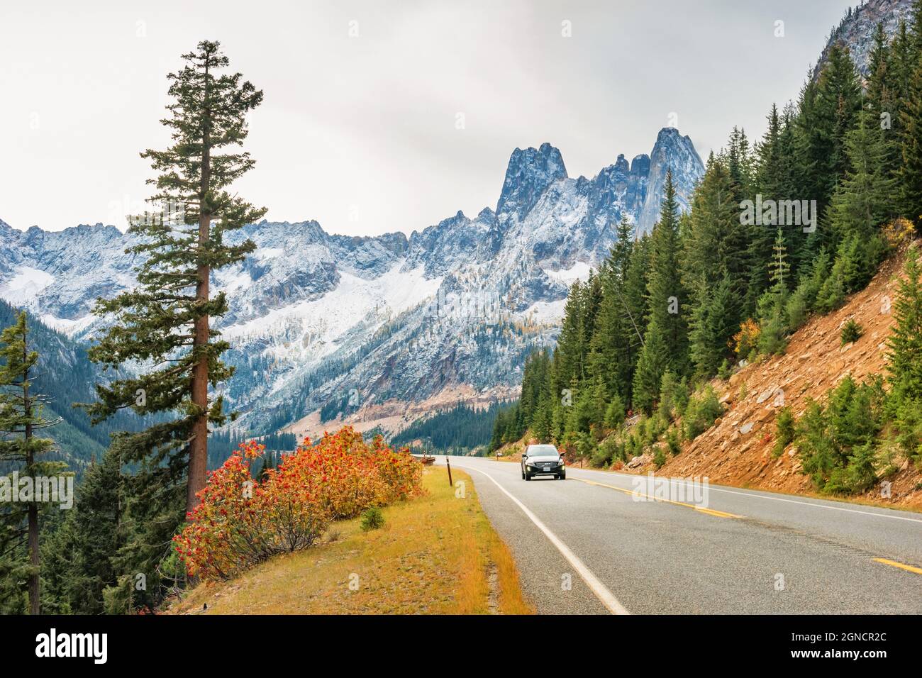 Car drives on highway 20, Washington Pass in North Cascades National Park, Washington state, USA Stock Photo