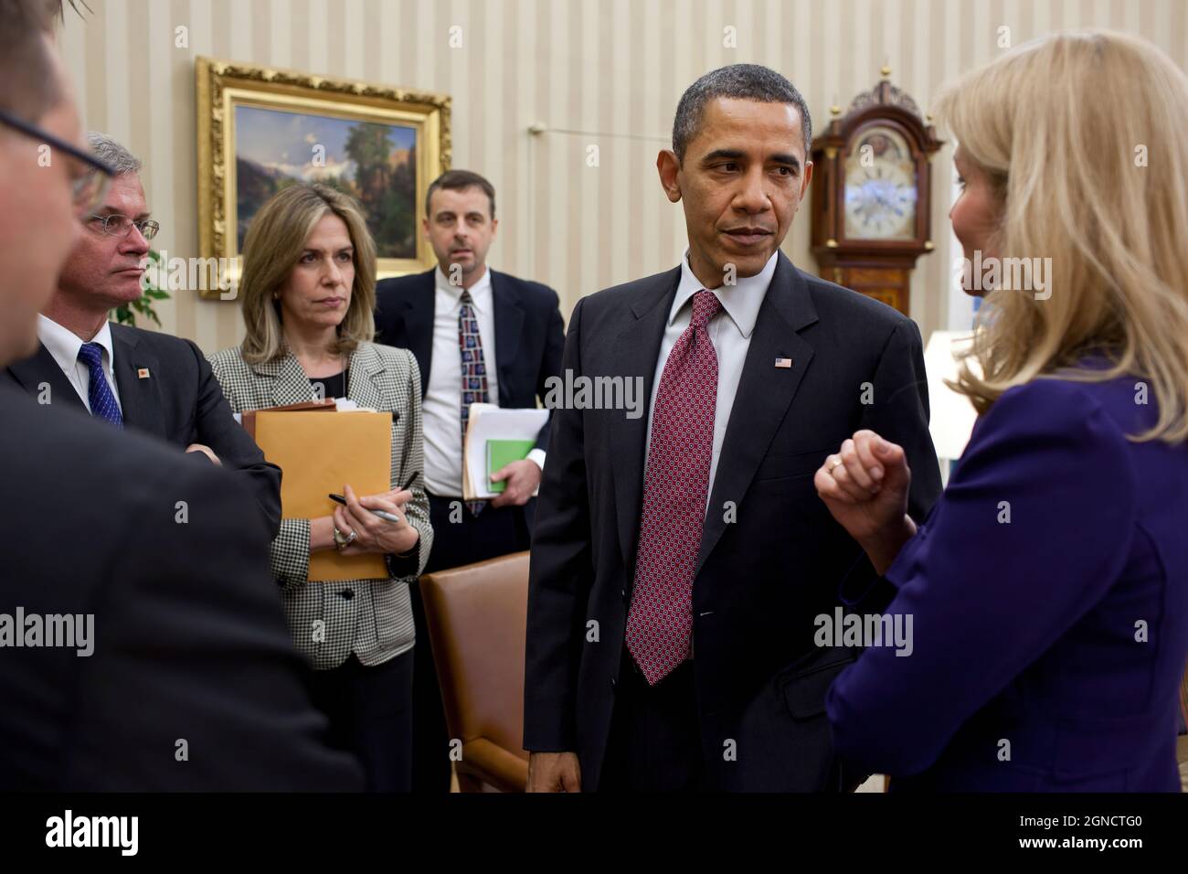 President Barack Obama and Prime Minister Helle Thorning-Schmidt of Denmark talk at the end of their bilateral meeting in the Oval Office, Feb. 24, 2012. Pictured, from left, are: Christian Kettel Thomsen, Permanent Secretary of State; Peter Taksoe-Jensen, Ambassador of Denmark to the United States; Liz Sherwood-Randall, Senior Director for European Affairs; and Bill Moeller, Director for Central European Affairs. (Official White House Photo by Pete Souza) This official White House photograph is being made available only for publication by news organizations and/or for personal use printing by Stock Photo