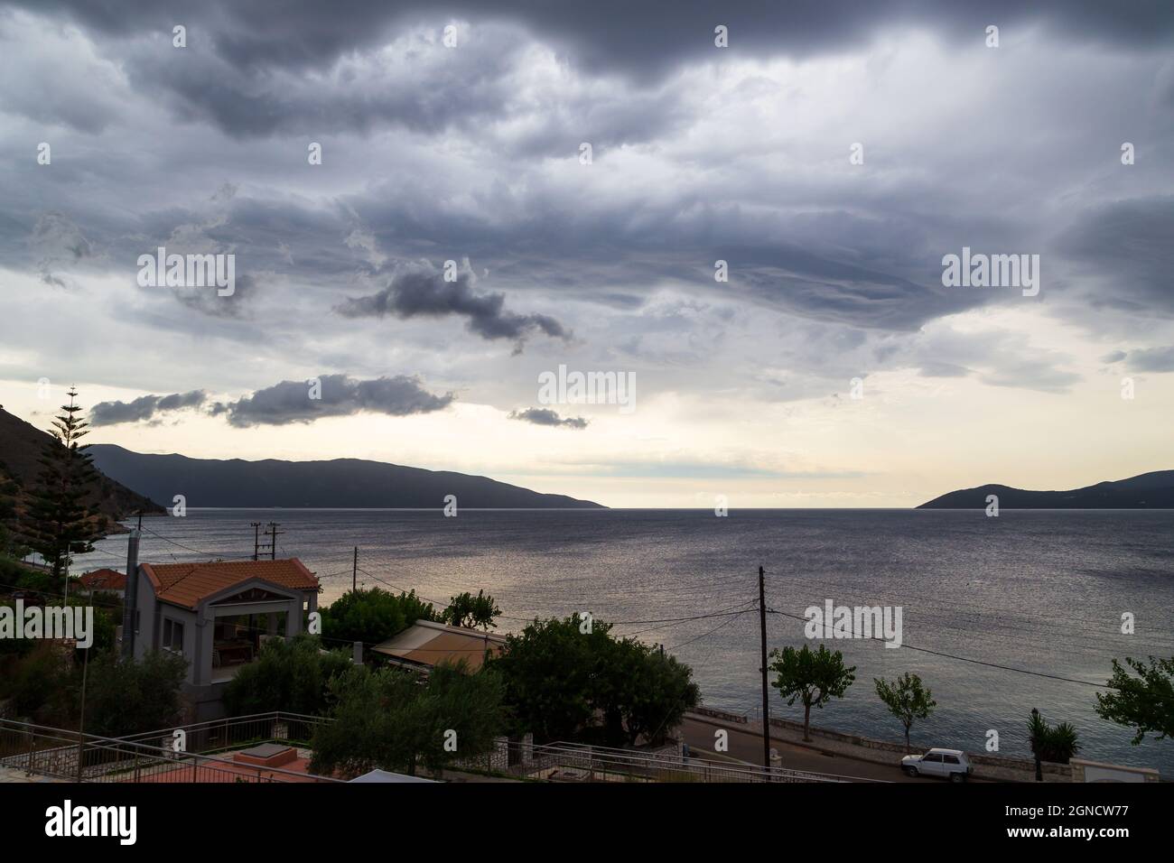 Dark dramatic sky with stormy clouds over sea Stock Photo - Alamy