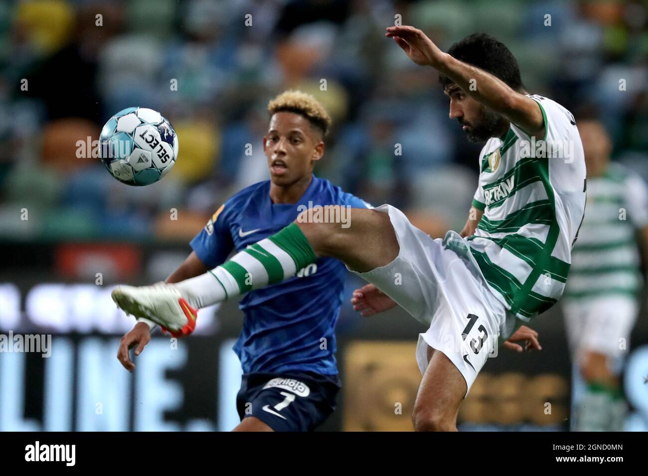 Lisbon, Portugal. 24th Sep, 2021. Luis Neto of Sporting CP (R ) vies with Andre Vidigal of CS Maritimo during the Portuguese League football match between Sporting CP and CS Maritimo at Jose Alvalade stadium in Lisbon, Portugal on September 24, 2021. (Credit Image: © Pedro Fiuza/ZUMA Press Wire) Credit: ZUMA Press, Inc./Alamy Live News Stock Photo