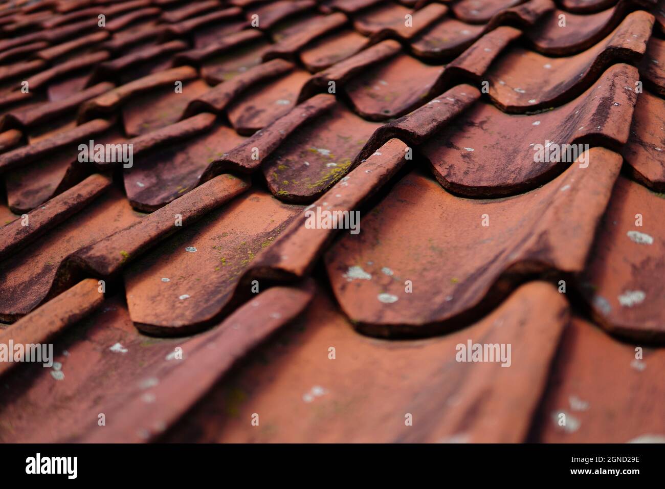 Closeup shot of old weathered roof tiles Stock Photo