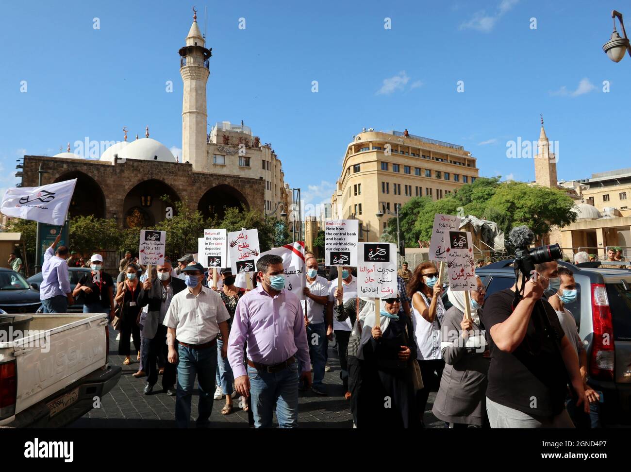 Beirut, Lebanon. 24th Sep, 2021. Depositors march towards banks, Beirut, Lebanon, on September 24, 2021. According to Bloomberg, Lebanon's annual rate of inflation has risen to the highest of all countries tracked, surpassing Zimbabwe and Venezuela. Depositors accuse Lebanese banks of making their money desappear abroad. (Photo by Elisa Gestri/Sipa USA) Credit: Sipa USA/Alamy Live News Stock Photo
