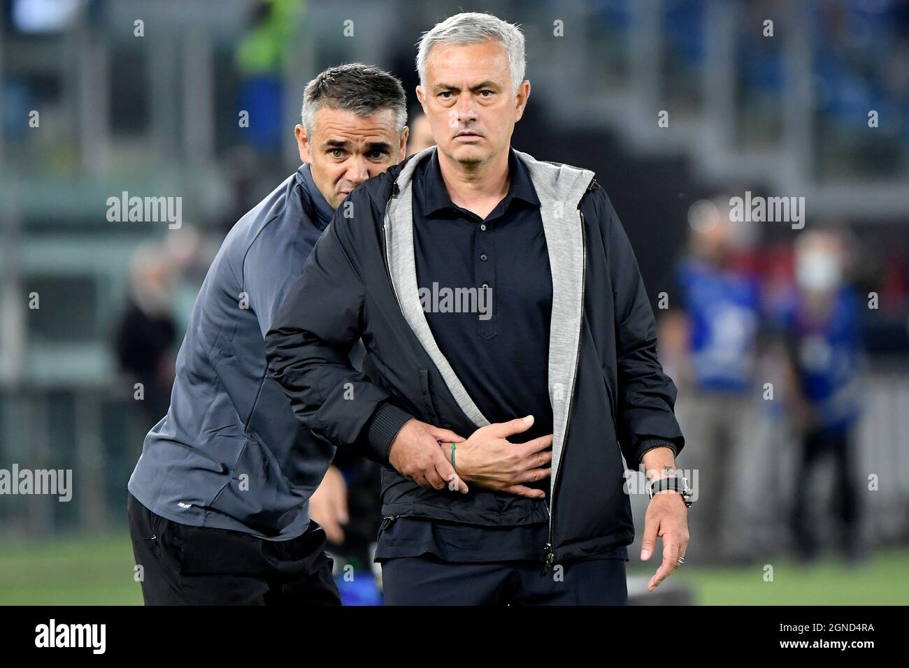 Roma, Italy. 23rd Sep, 2021. Jose Mourinho coach of AS Roma, held by Nuno  Gomes, reacts during the Serie A football match between AS Roma and Udinese  calcio at Olimpico stadium in