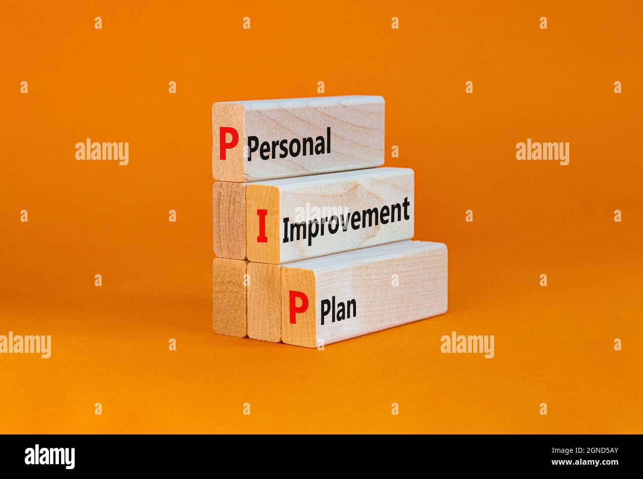 PIP, Personal improvement plan symbol. Words PIP, Personal improvement plan symbol on blocks on a beautiful orange background. Business, PIP, Personal Stock Photo