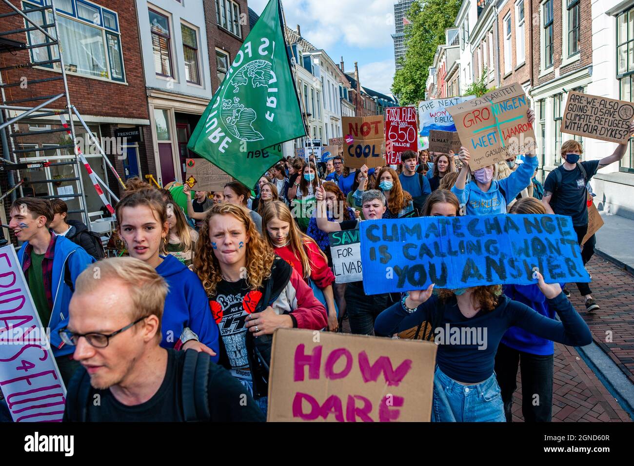 Utrecht, Netherlands. 24th Sep, 2021. Activists hold placards during the  demonstration.This Friday, tens of thousands of kids in more than 60  countries went on strike to demand climate change action. #FridaysForFuture  is