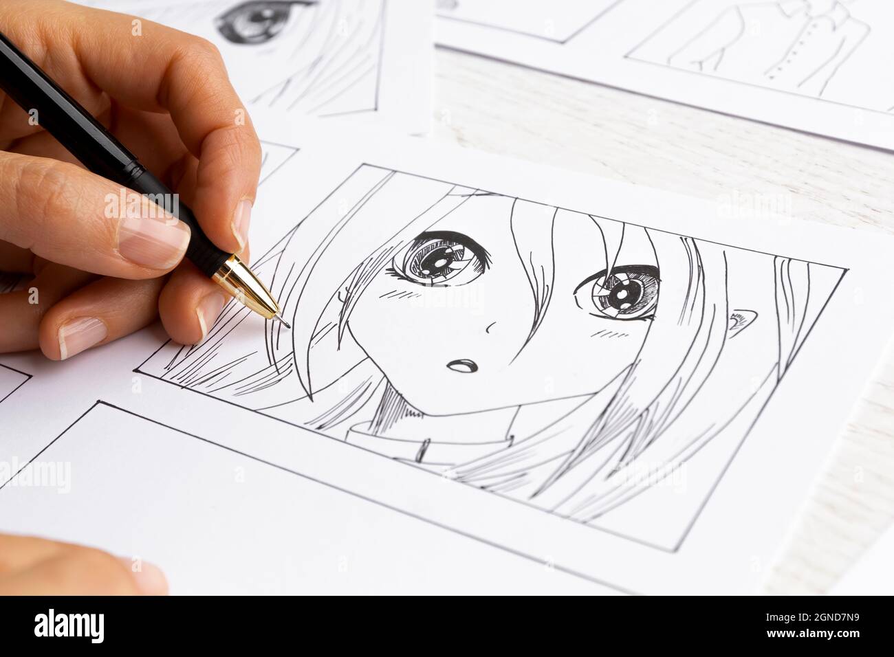 Manga style. The artist draws anime comics on paper. The illustrator creates sketches for the book Stock Photo - Alamy Manga style. The artist draws anime comics on paper. The illustrator creates sketches for the book Stock Photo - Alamy
